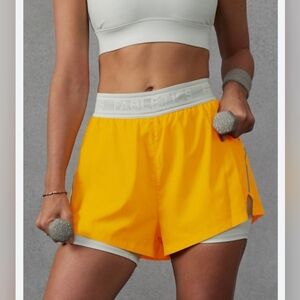 Fabletics NWT Perforated Run 5" Shorts Womens XS Lined Yellow Orange Active Gym